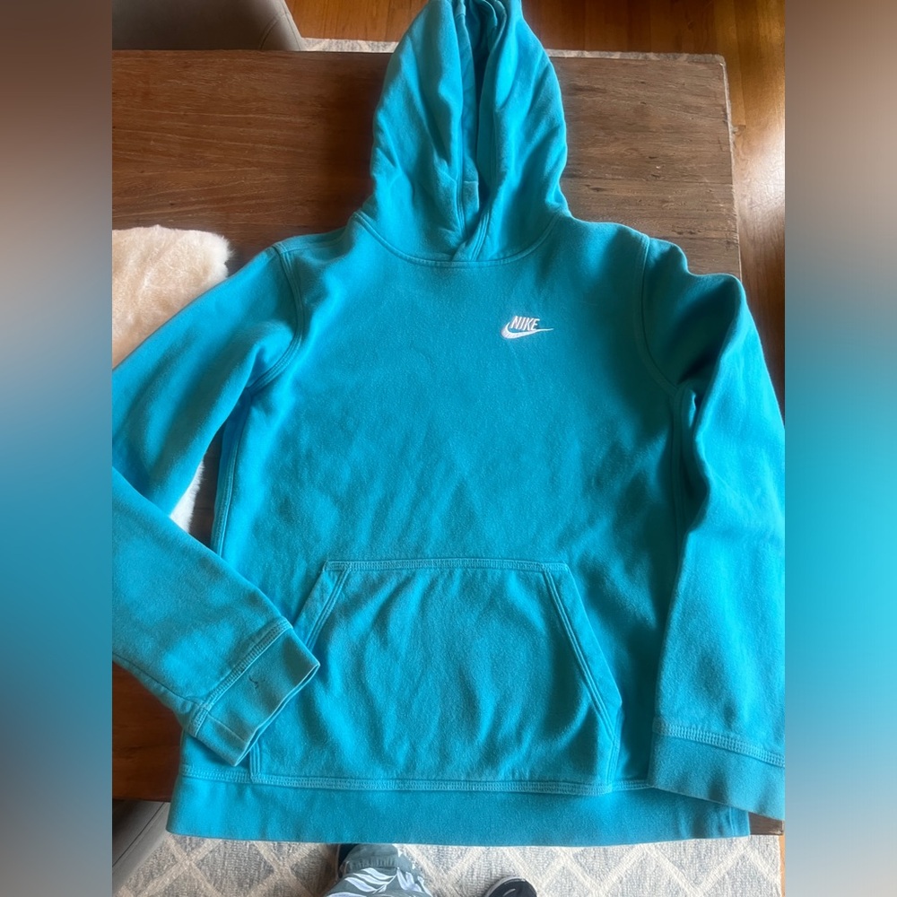 Nike teal blue hoodie youth xl. Good condition minor spot on sleeve pictured